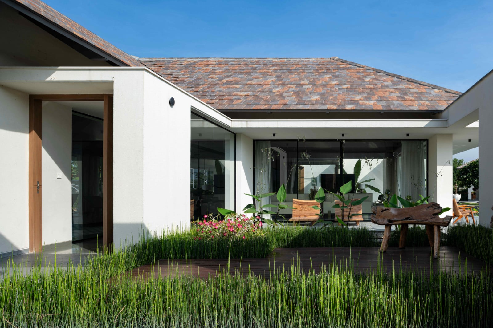Interwoven courtyards maintain a constant connection with the surrounding nature