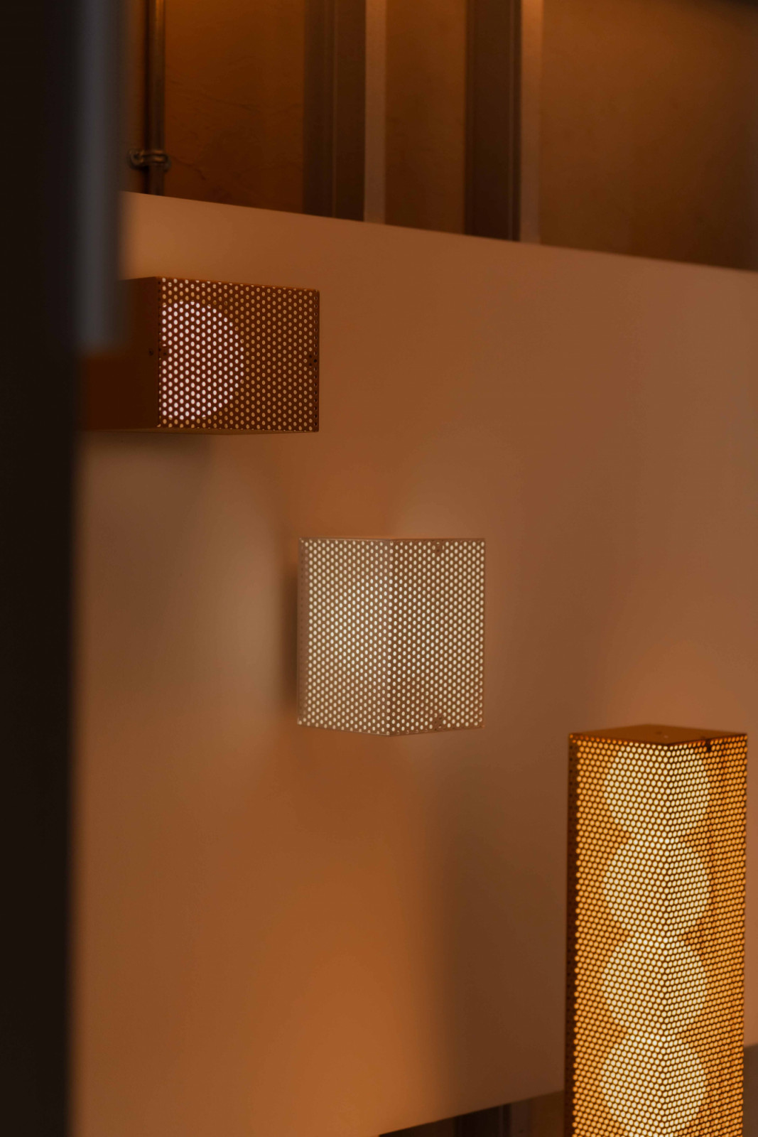 The Perforated Boba, an expansion of the Aeon Boba family, its warm glow encased in perforated steel