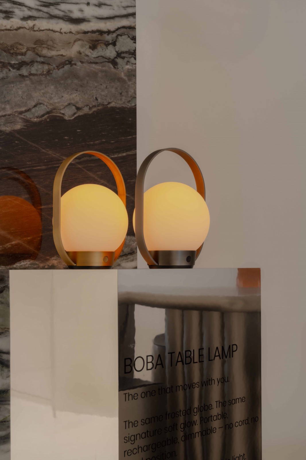 The Aeon Boba Table Lamp, Sol Luminaire’s first portable light, with its signature frosted globe and soft glow
