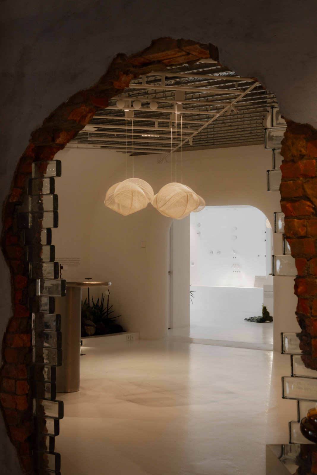 LightMass^ suspended forms at Sol Luminaire’s showroom, fluid geometric sculptures at the intersection of physics and art