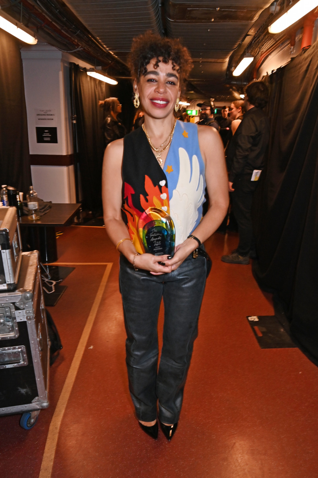 LONDON, ENGLAND - DECEMBER 04: Martine Rose, winner of the British Menswear Designer Award, poses backstage at The Fashion Awards 2023 presented by Pandora at The Royal Albert Hall on December 4, 2023 in London, England. (Photo by Dave Benett/Getty Images)