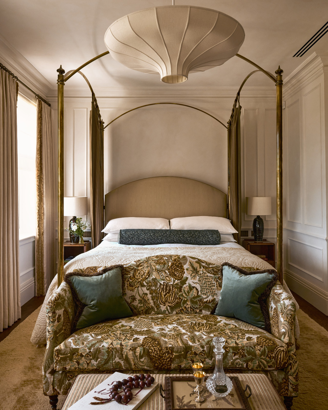 The primary bedroom of a Surrey, England family home designed by Linda Boronkay of Boronkay Studio