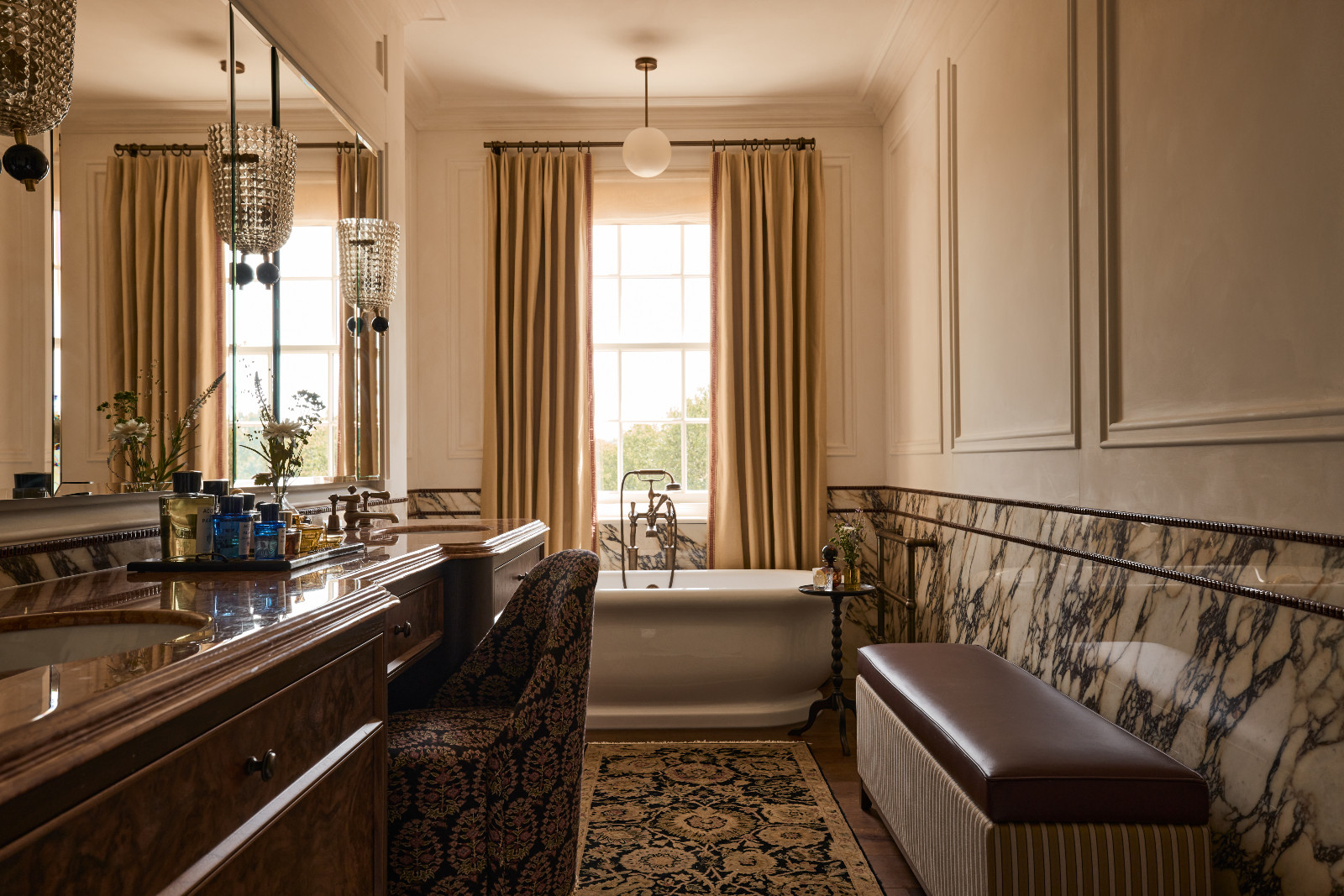 The primary ensuite bathroom of a Surrey, England family home designed by Linda Boronkay of Boronkay Studio