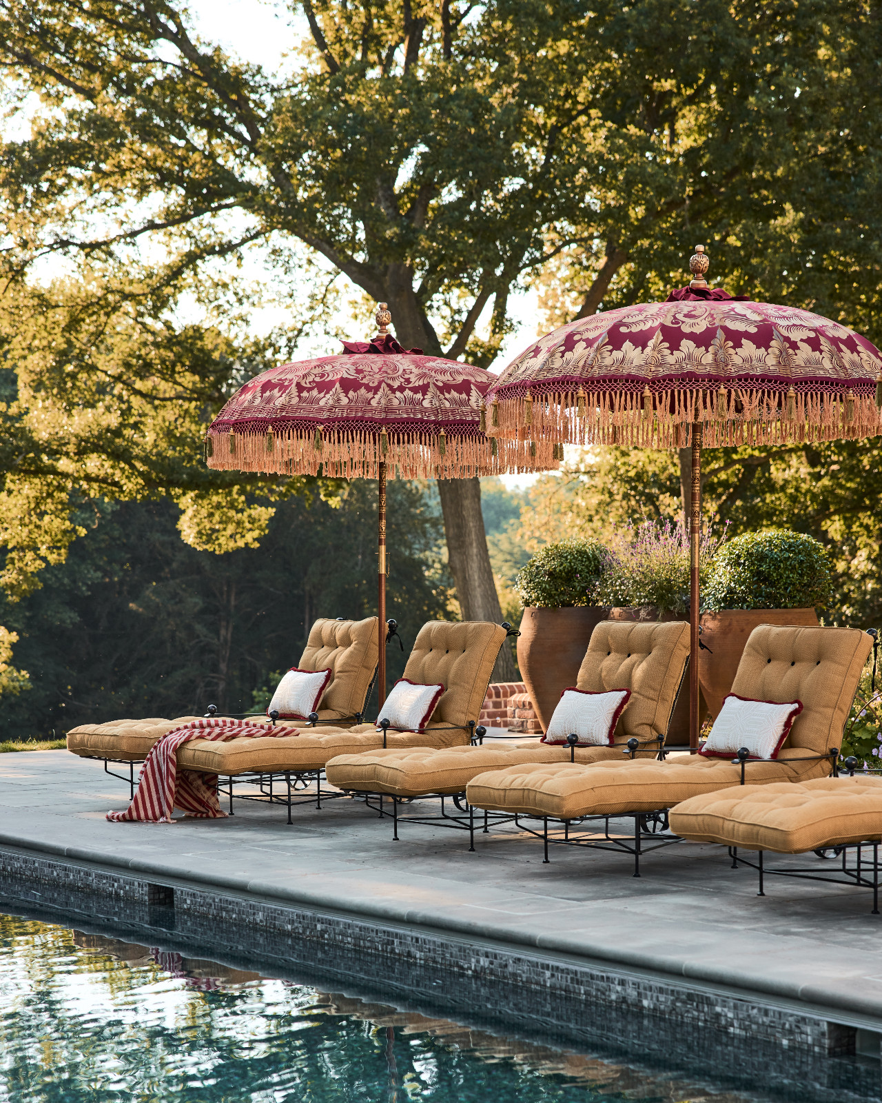 The pool area of a Surrey, England family home designed by Linda Boronkay of Boronkay Studio