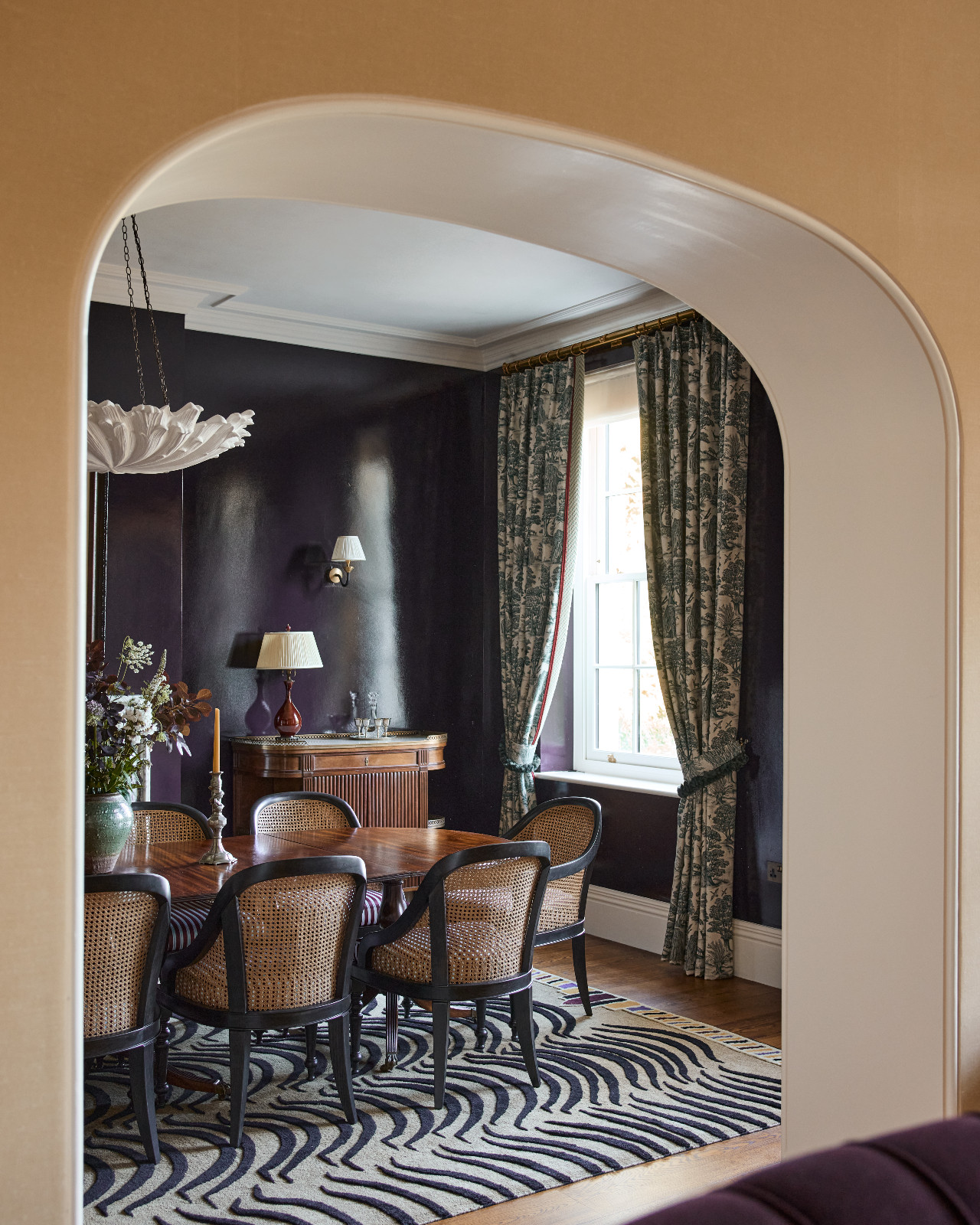 The formal dining room of a Surrey, England family home designed by Linda Boronkay of Boronkay Studio