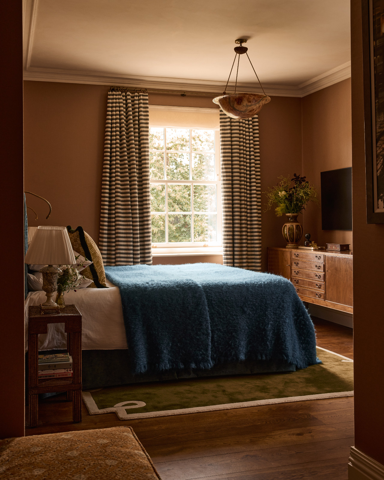 The secondary bedroom of a Surrey, England family home designed by Linda Boronkay of Boronkay Studio