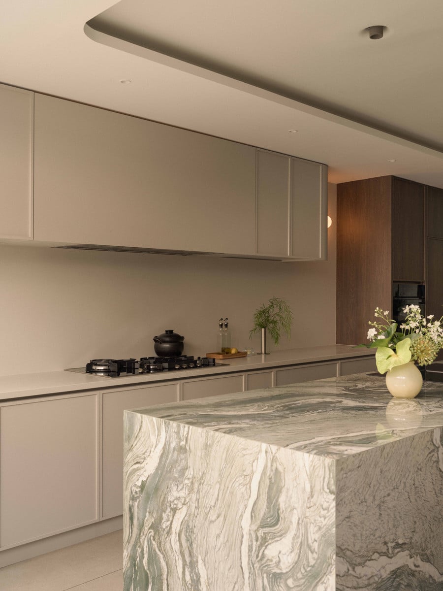 The five-metre-long island counter, Leong's "chef's dream," is wrapped in Infinity Iconic Cipollino porcelain