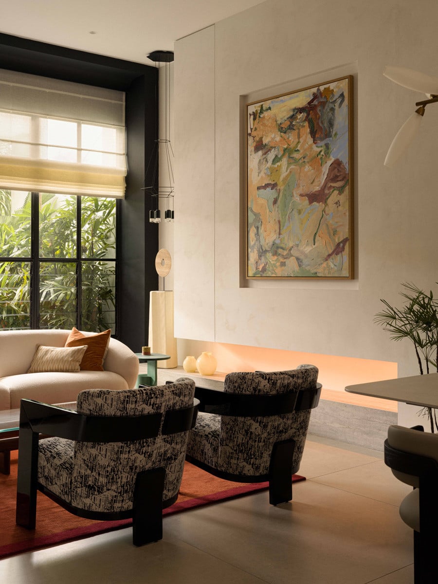 Lloyd Tabing’s “Tell Me What You Want” artwork adds character to the terrace house’s living room