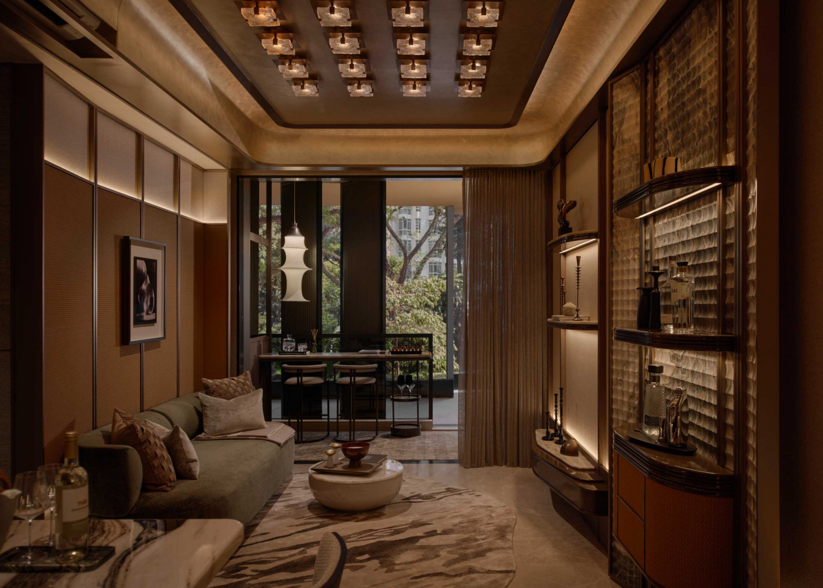 This unit unfolds as a continuous sequence, linking lounge, dining area and balcony through a consistent material palette and controlled lighting