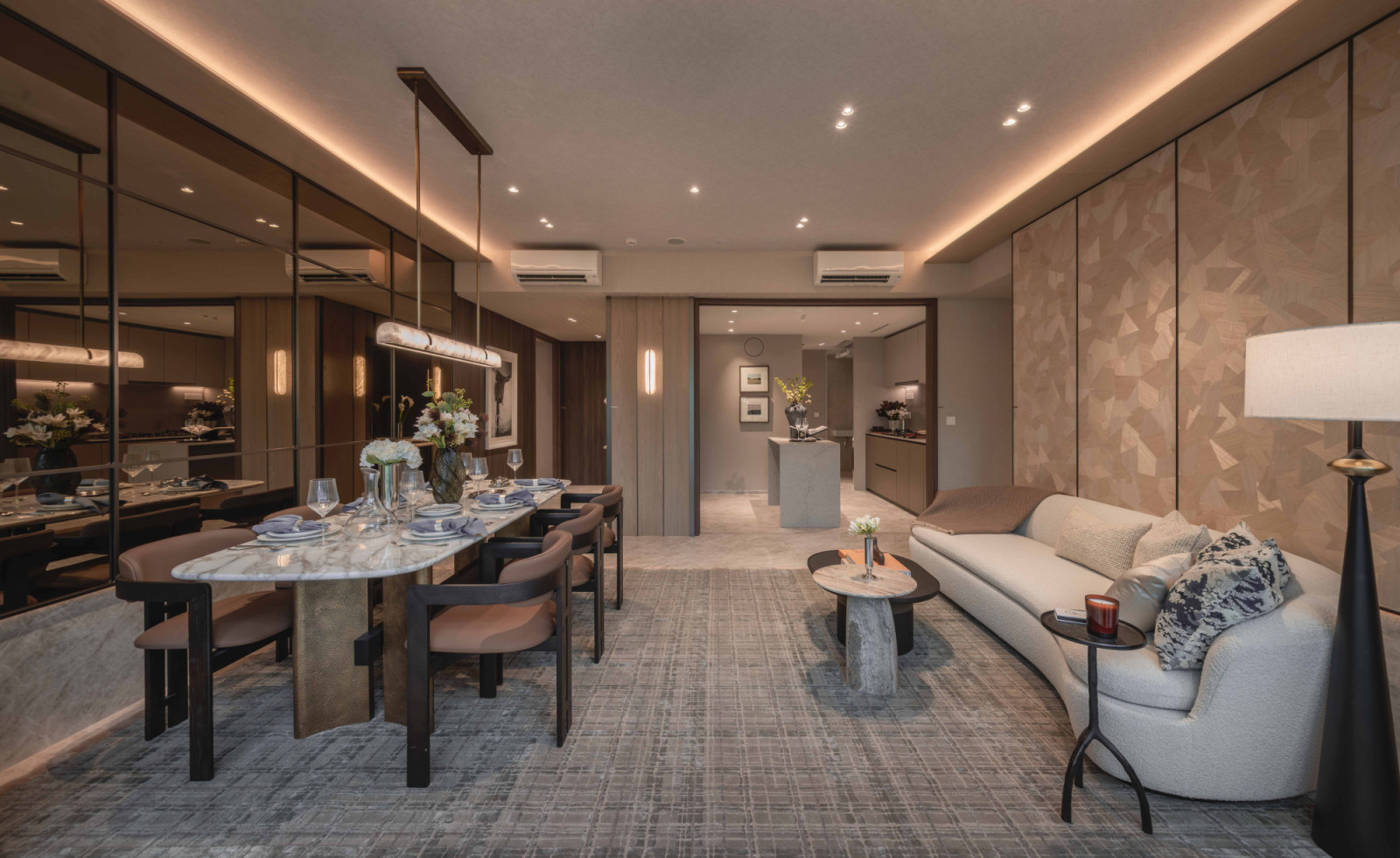 A sleek, contemporary living and dining area in a Dunearn House show unit