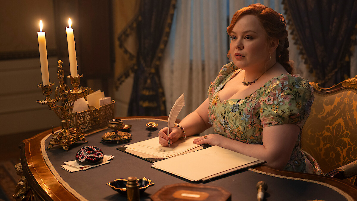Nicola Coughlan as Penelope Featherington: A media mogul whose idea of a company-wide memo is publishing your most scandalous secrets to the entire ton. (Photo: courtesy of Netflix)