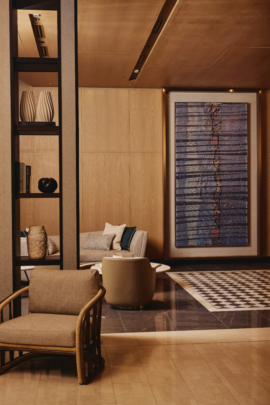 Francis Dravigny’s works with Filipino textiles at Aurelia Residences in Bonifacio Global City, Manila