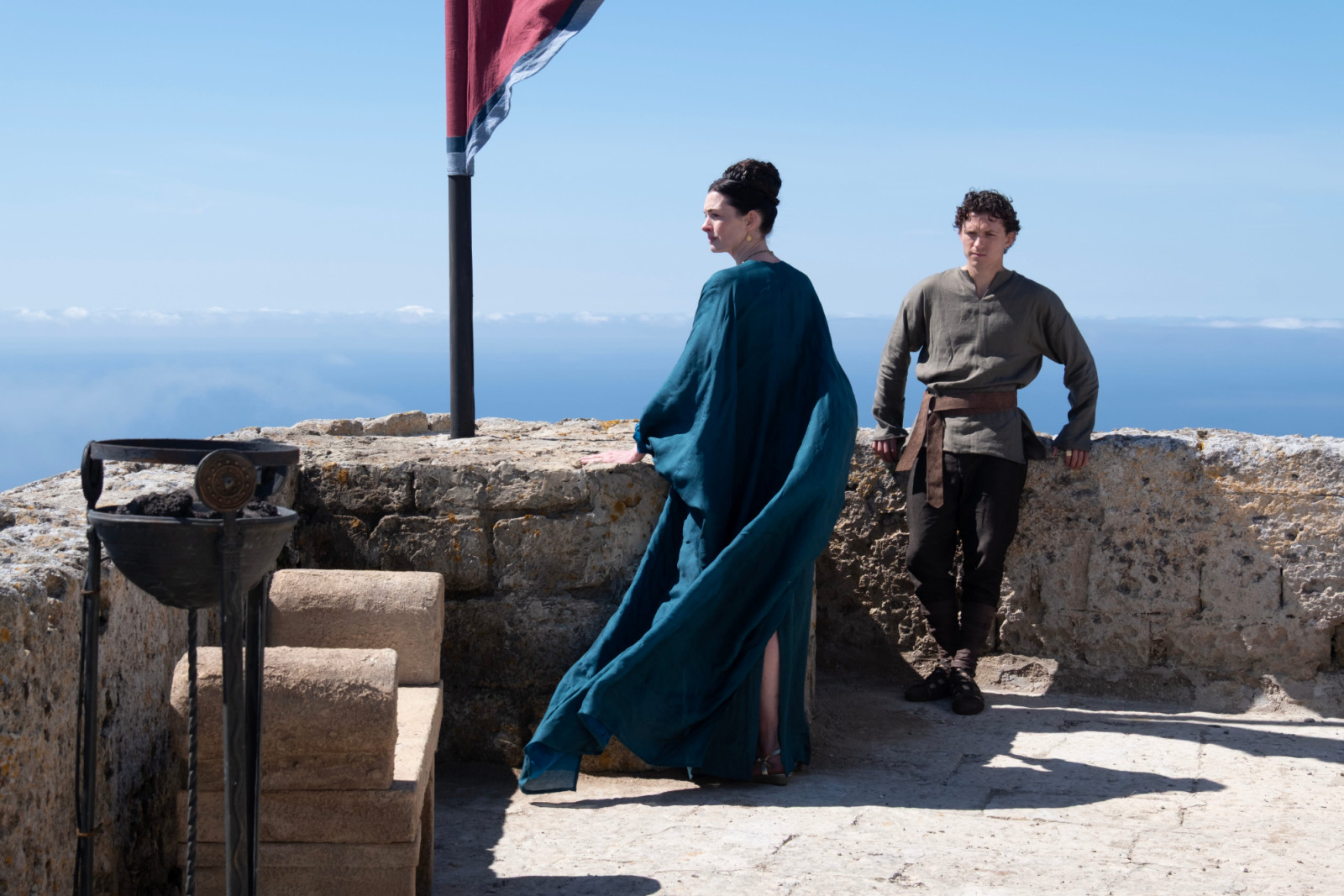 Anne Hathaway as Penelope and Tom Holland as Telemachus in 'The Odyssey'.