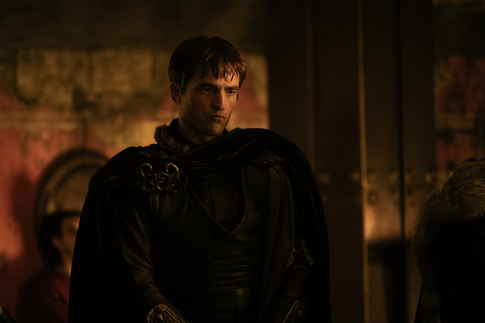 Robert Pattinson as Antinous, restraint that makes him more unsettling than any villain.