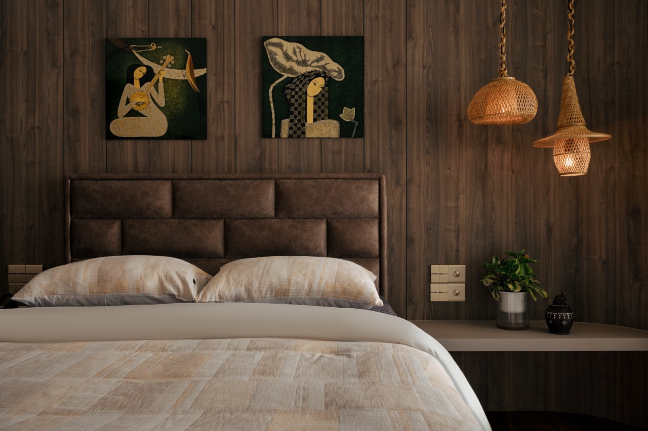 Timber wall panelling and a leather-look upholstered headboard anchor the guest bedroom