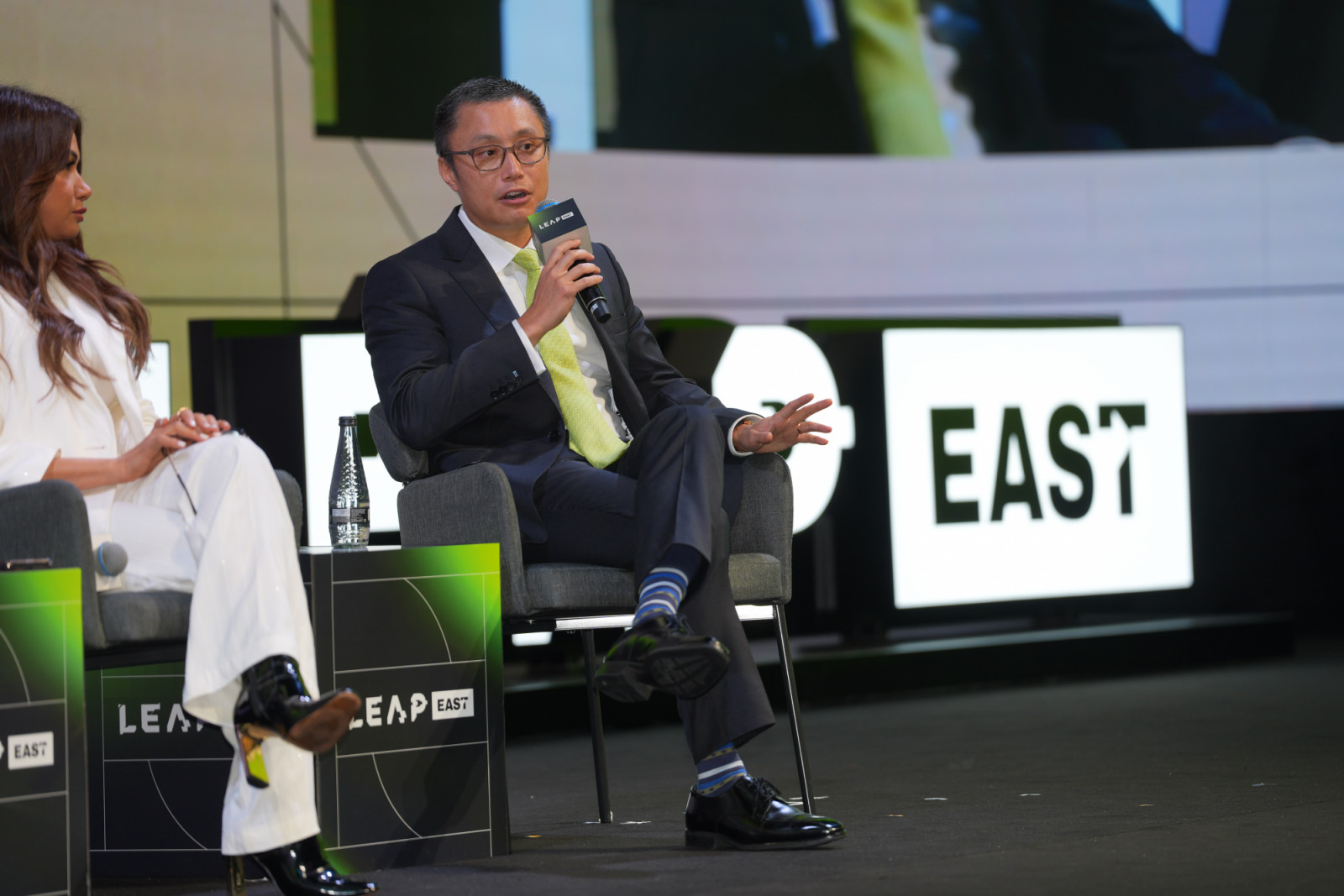 WeLab founder and group CEO, Simon Loong, speaking at the LEAP East tech conference in July 2026 (Photo: courtesy of LEAP East)