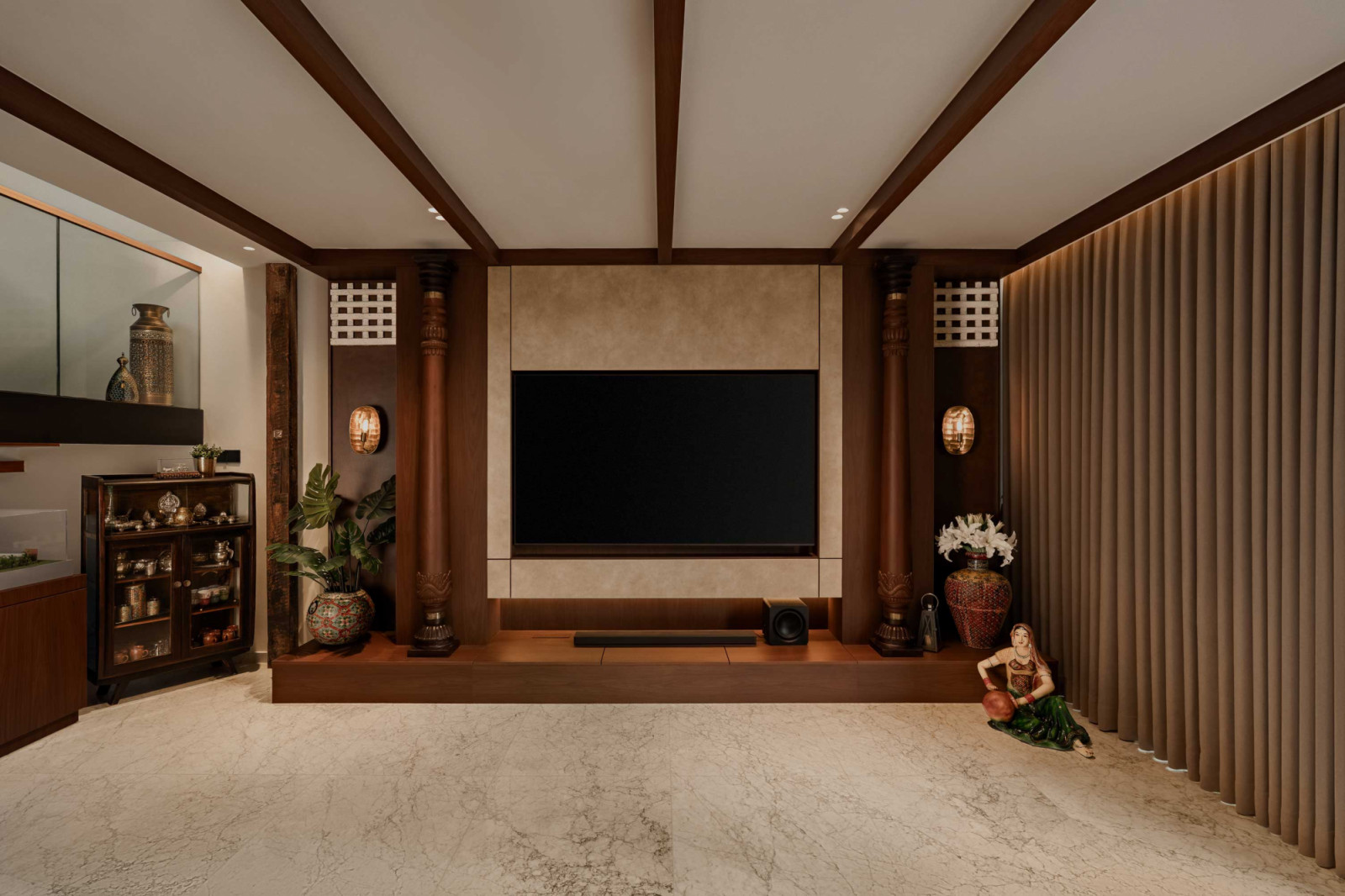 Carved timber columns frame the media wall
