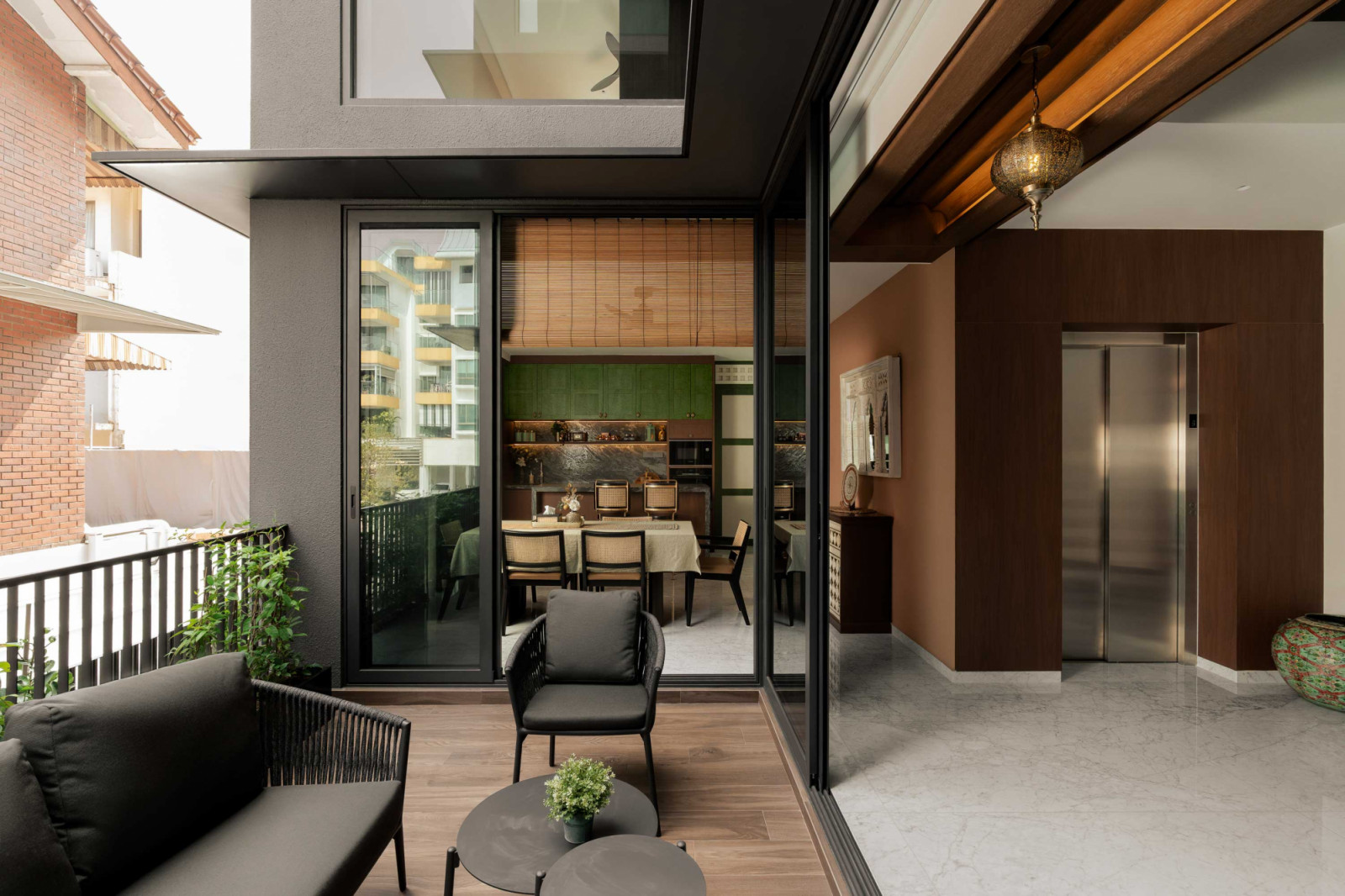 Sliding glass doors connect the dining area to a balcony