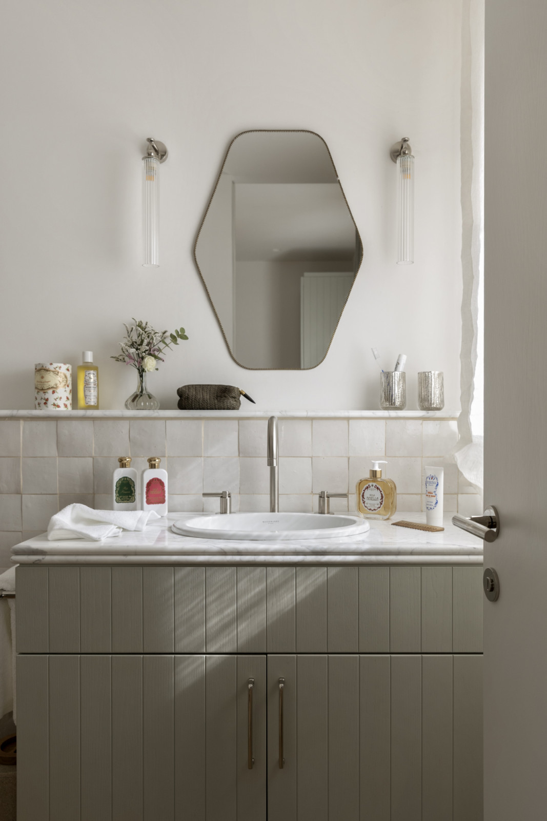 Bathrooms are treated with the same attention to materiality