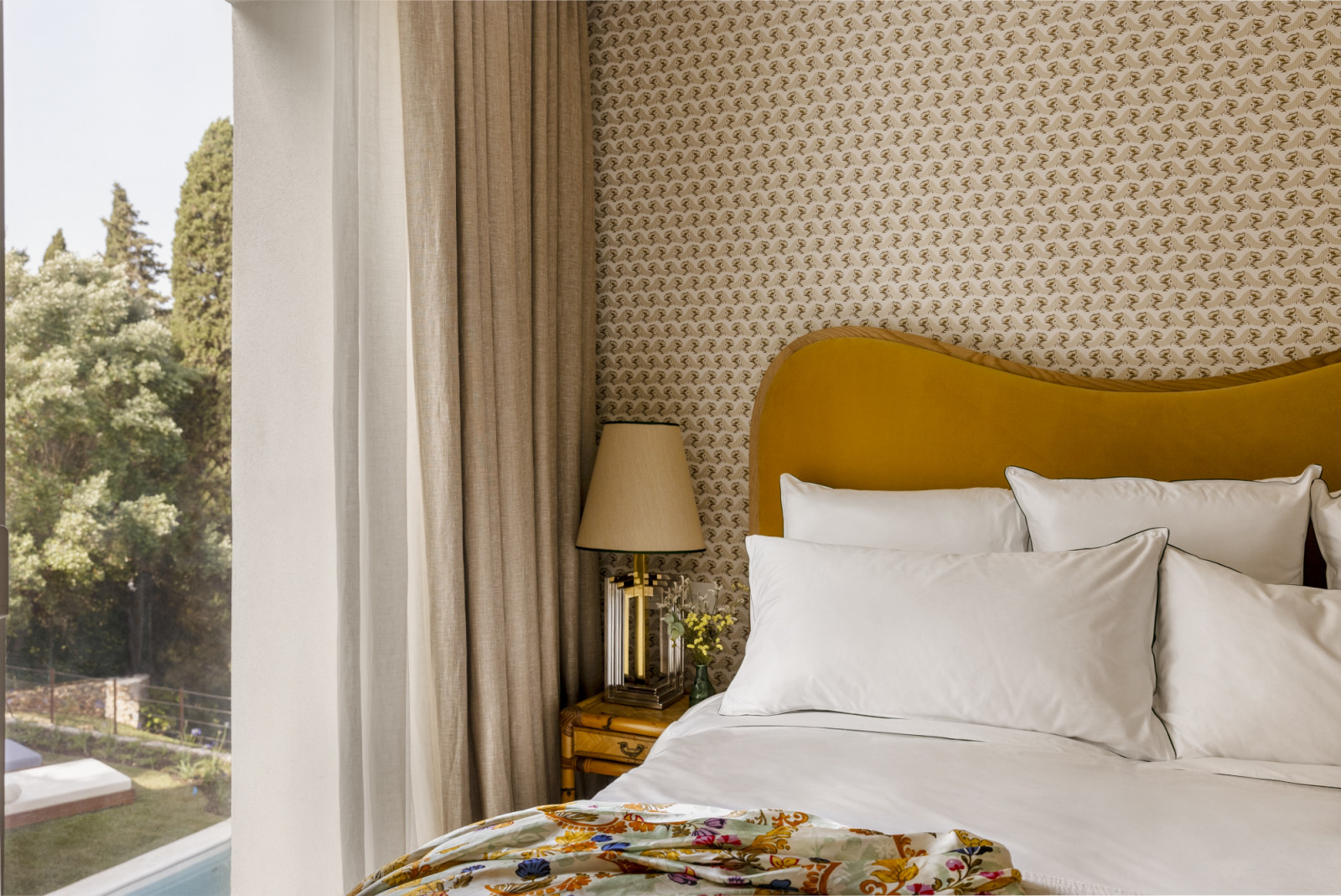 The garden-facing bedrooms use yellows, greens and whites
