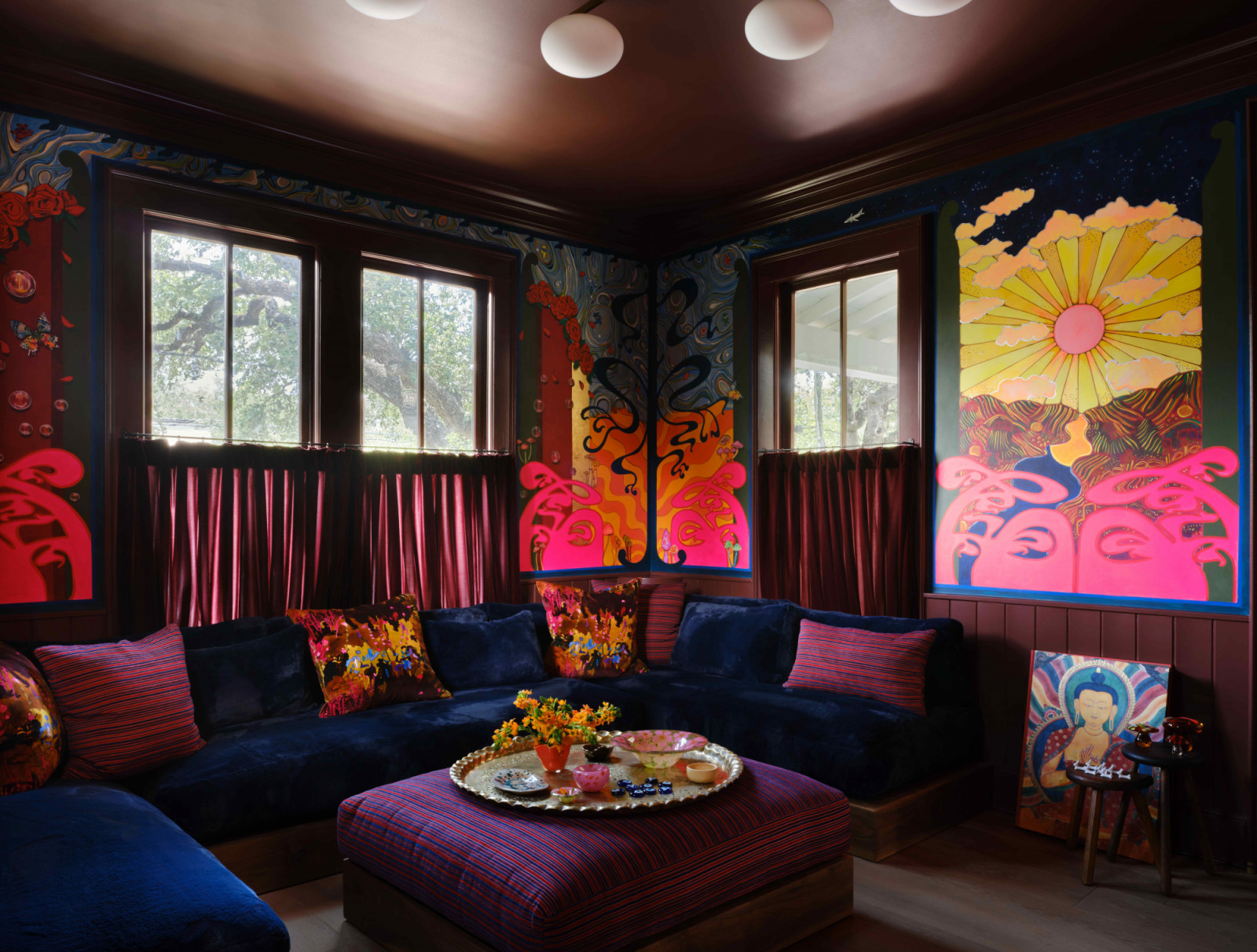 The distinctive mural art makes for a great background for the homeowner’s Zoom calls
