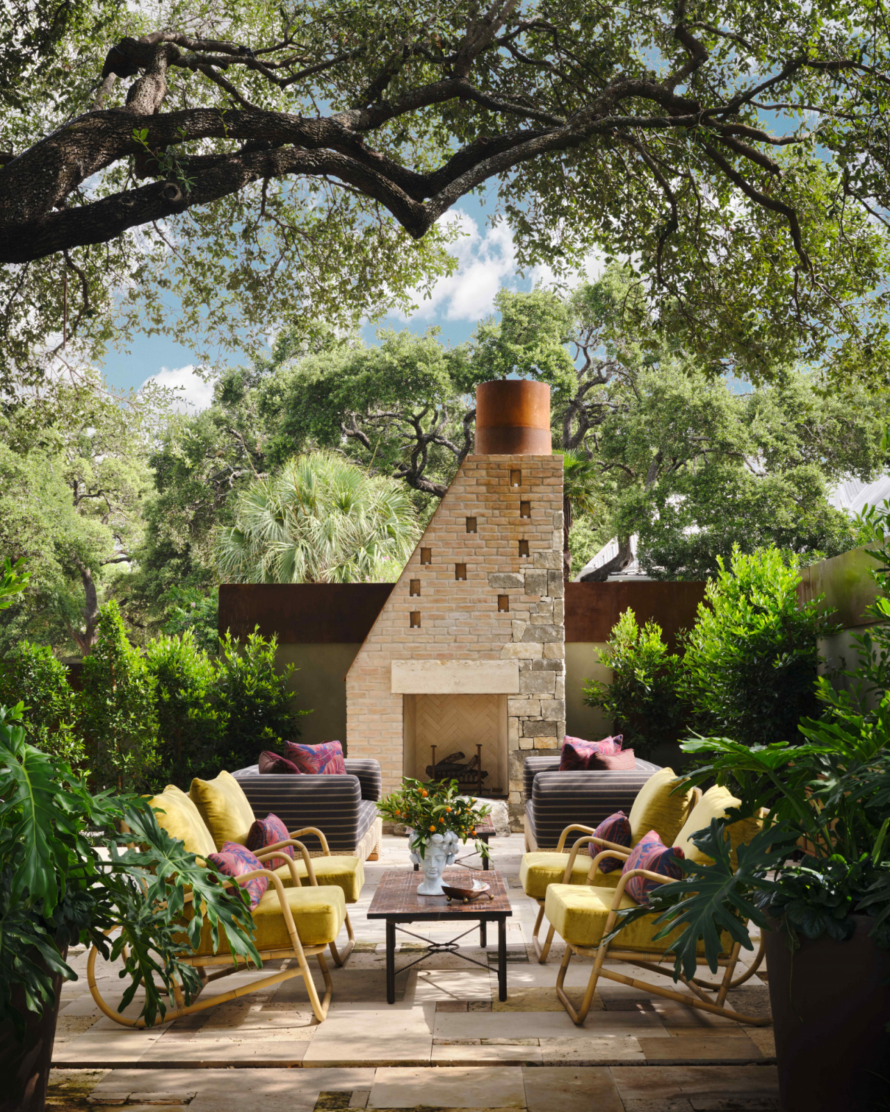 The outdoor seating area amidst lush greenery