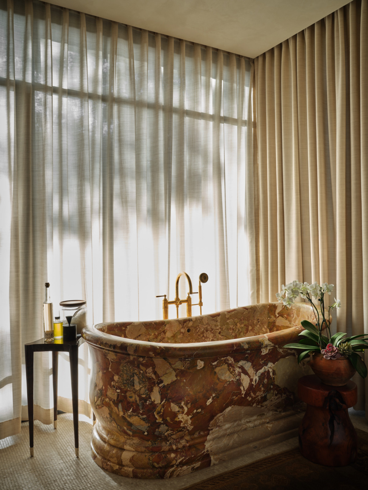 The bathtub was custom carved from a single block of Breccia Pontificia marble in Italy (Photo: Clay Grier)