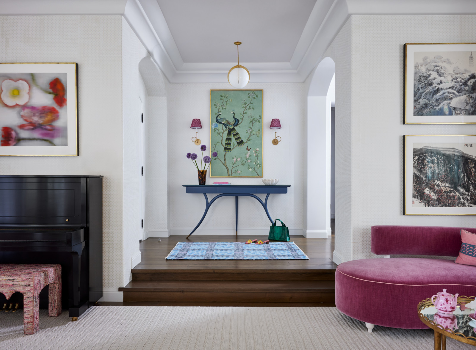 Rich shades of emerald, blue, and raspberry bring personality to the home's original Mediterranean architecture