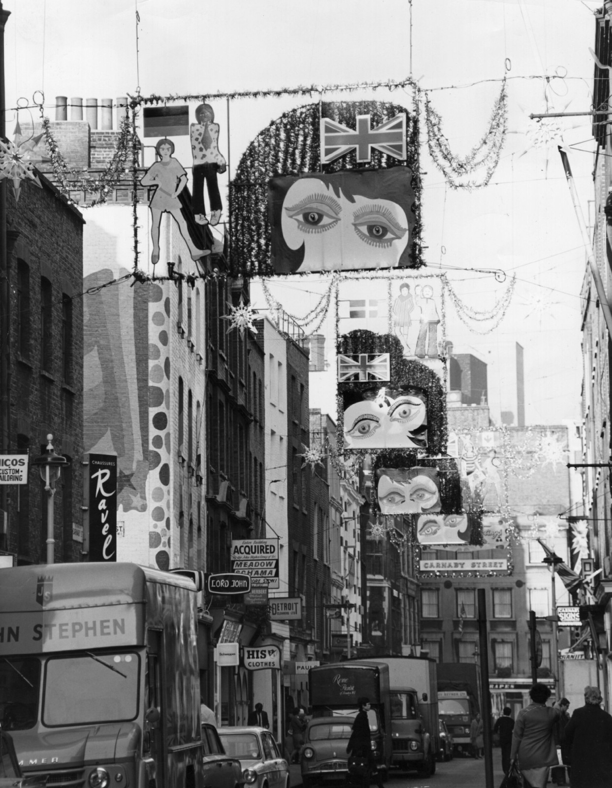 December 1967:  Christmas decorations in Carnaby Street, in the swinging sixties.  (Photo by Brooks/Keystone/Getty Images)