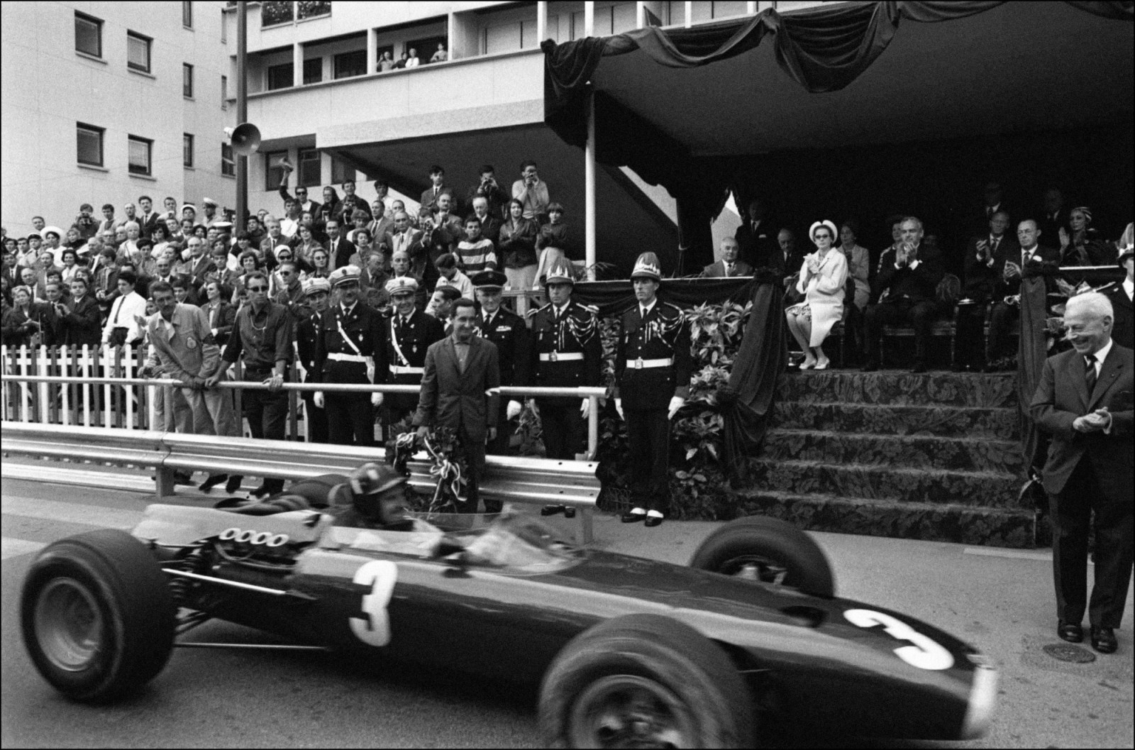 MONACO - MAY 31:  Monaco/Grand Prize Of F1: The Winner And The Vip Stand With Prince Rainier And Princess Grace In Monaco On May 31, 1965  (Photo by REPORTERS ASSOCIES/Gamma-Rapho via Getty Images)