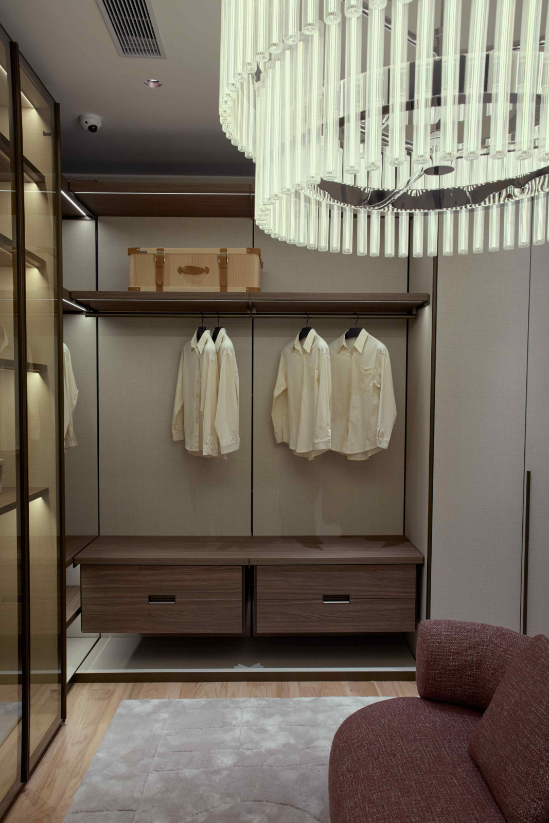 The walk-in wardrobe features an expansive Molteni&C cabinetry
