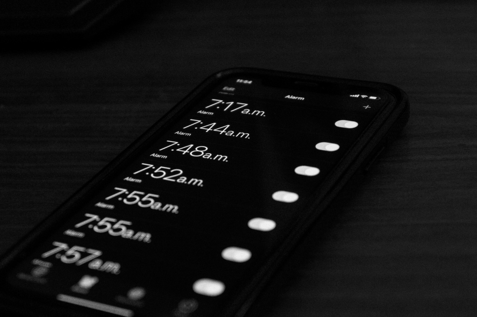 Photo of a phone screen with multiple alarms set (Photo: Gary Ruiz/Unsplash)