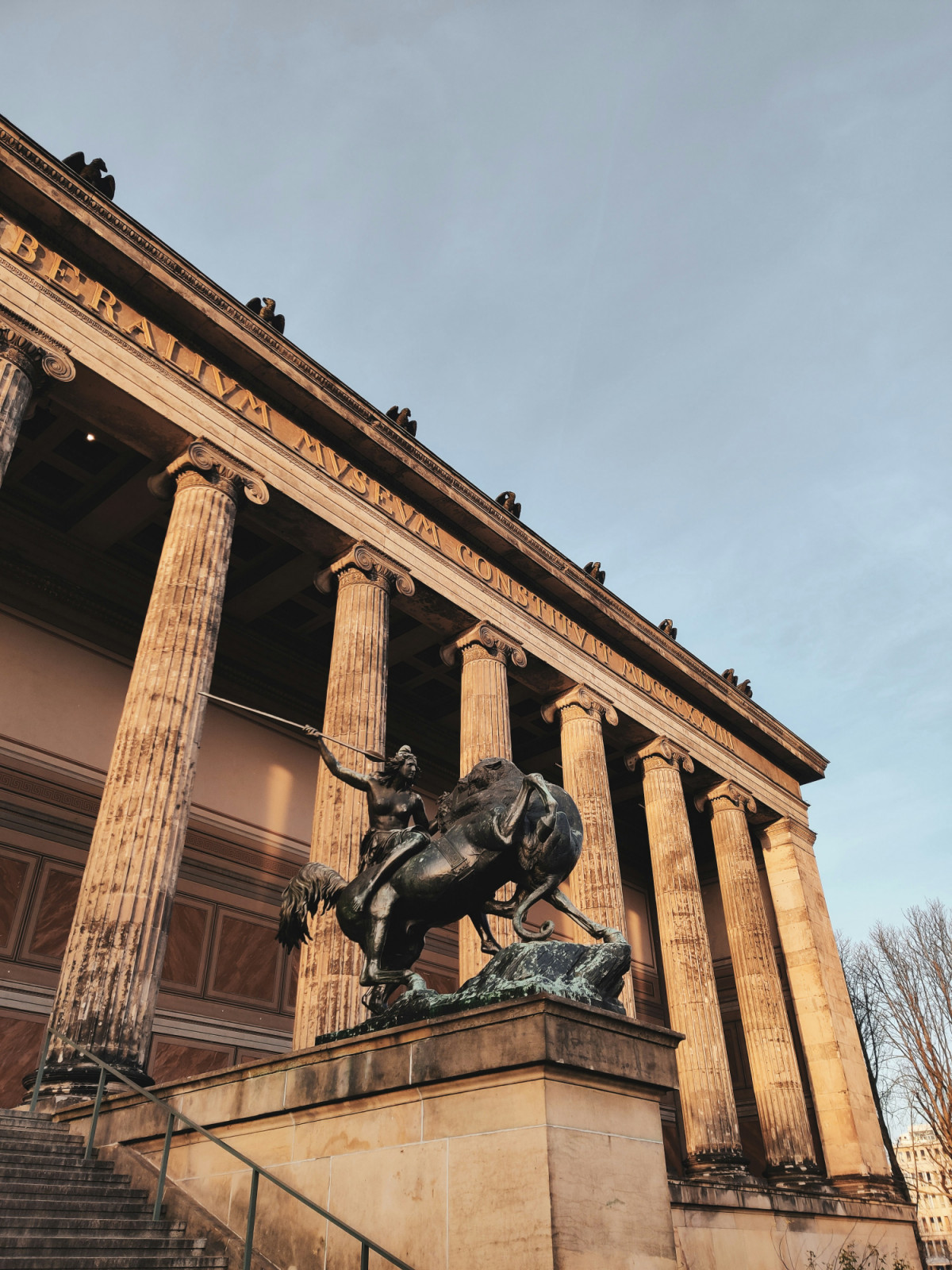 One of the bronze horse-tamer groups flanking the entrance was added after the museum’s initial completion (Photo: Unsplash/ Shannia Christanty)
