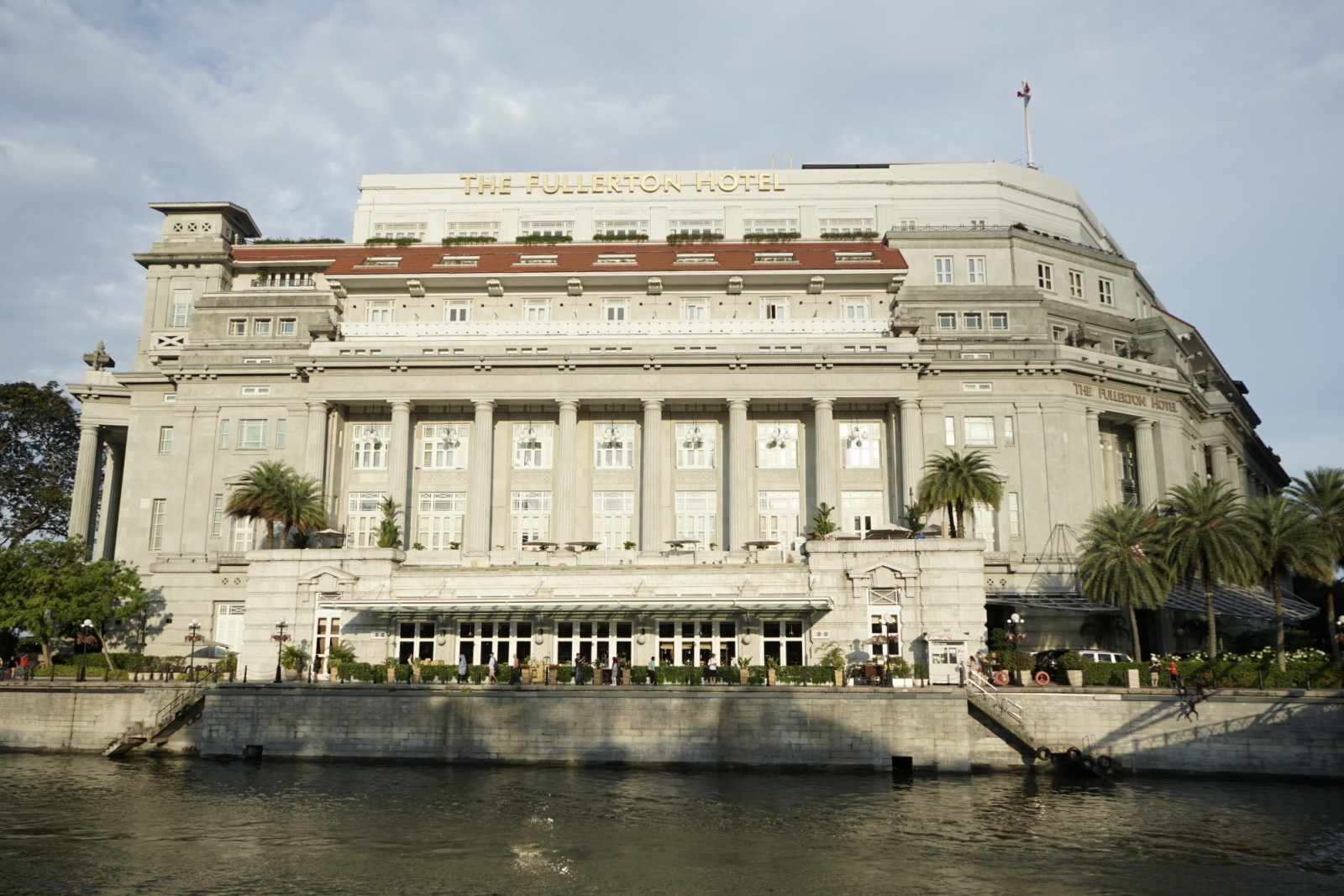 The Fullerton seen from the Singapore River, its original 1928 granite facade largely intact along the waterfront (Photo: iStock)