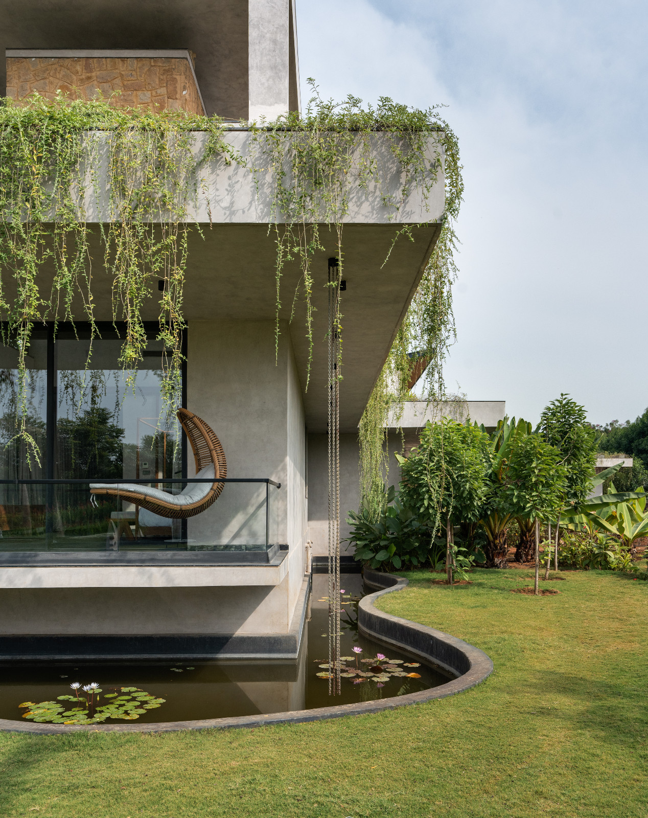 The garden of a multigenerational home designed by 23 Degrees Design Shift in Hyderabad, India