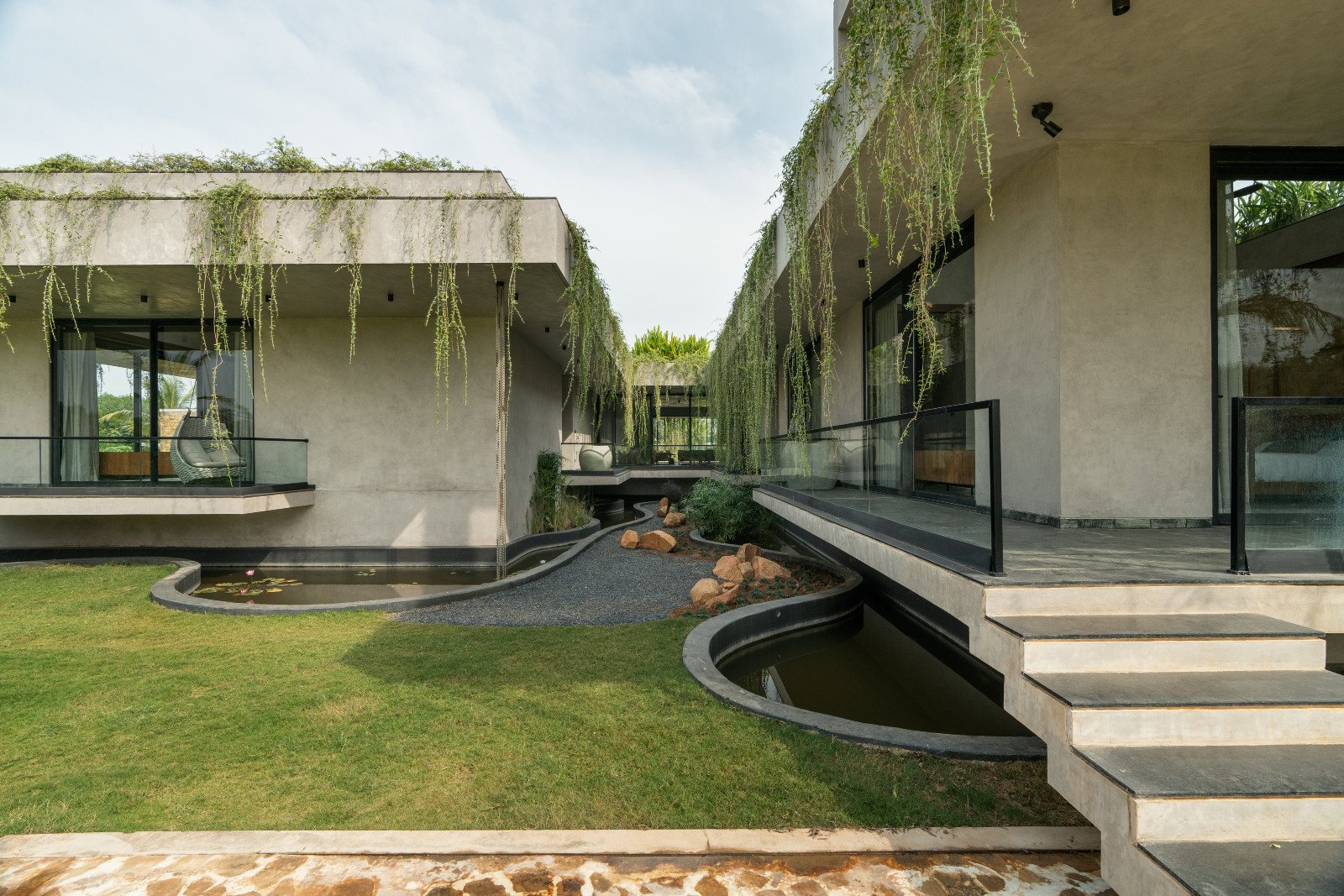 The garden of a multigenerational home designed by 23 Degrees Design Shift in Hyderabad, India
