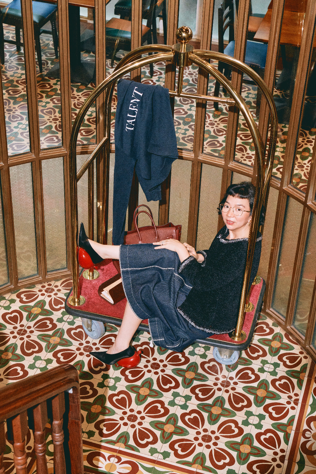 Sarenas wears a Chanel top, a Carl Jan Cruz skirt and Loewe shoes; Sarenas wears frames from Vision Express
