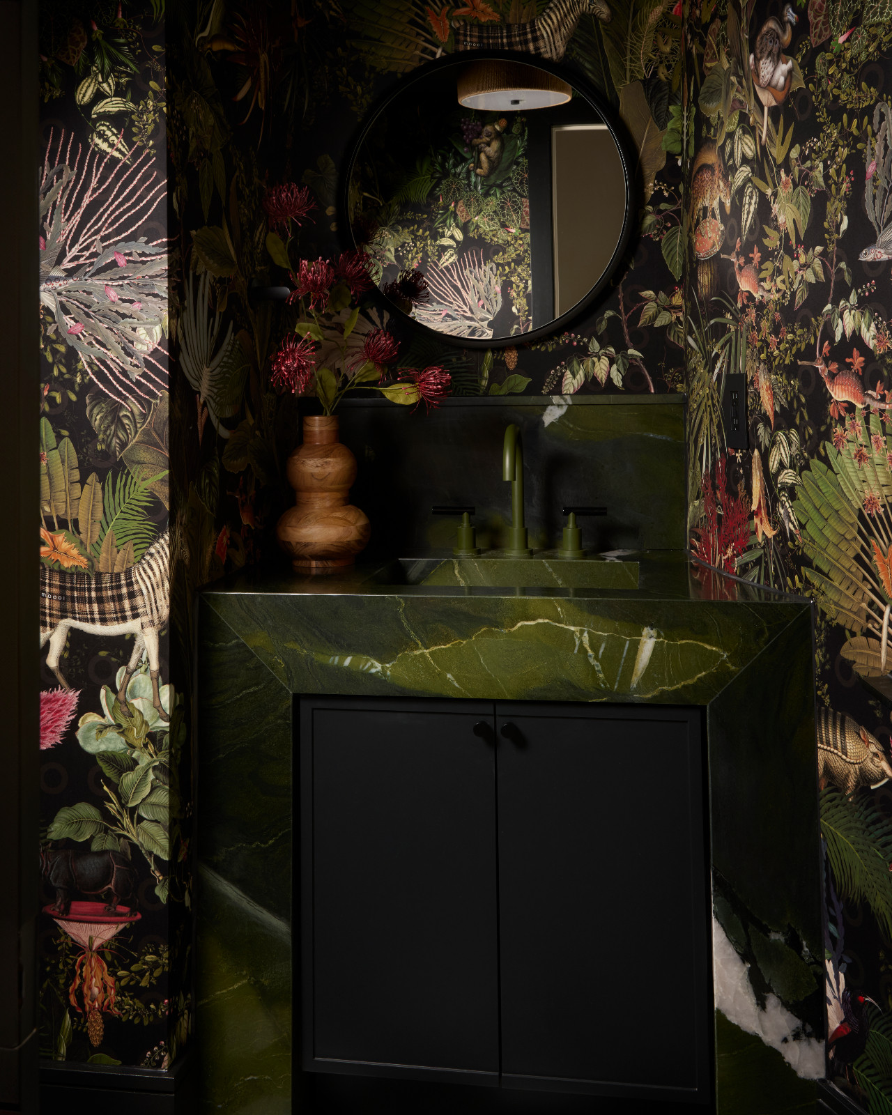 The powder room of a 1980s penthouse, renovated by Dvira Interiors in Toronto, Canada
