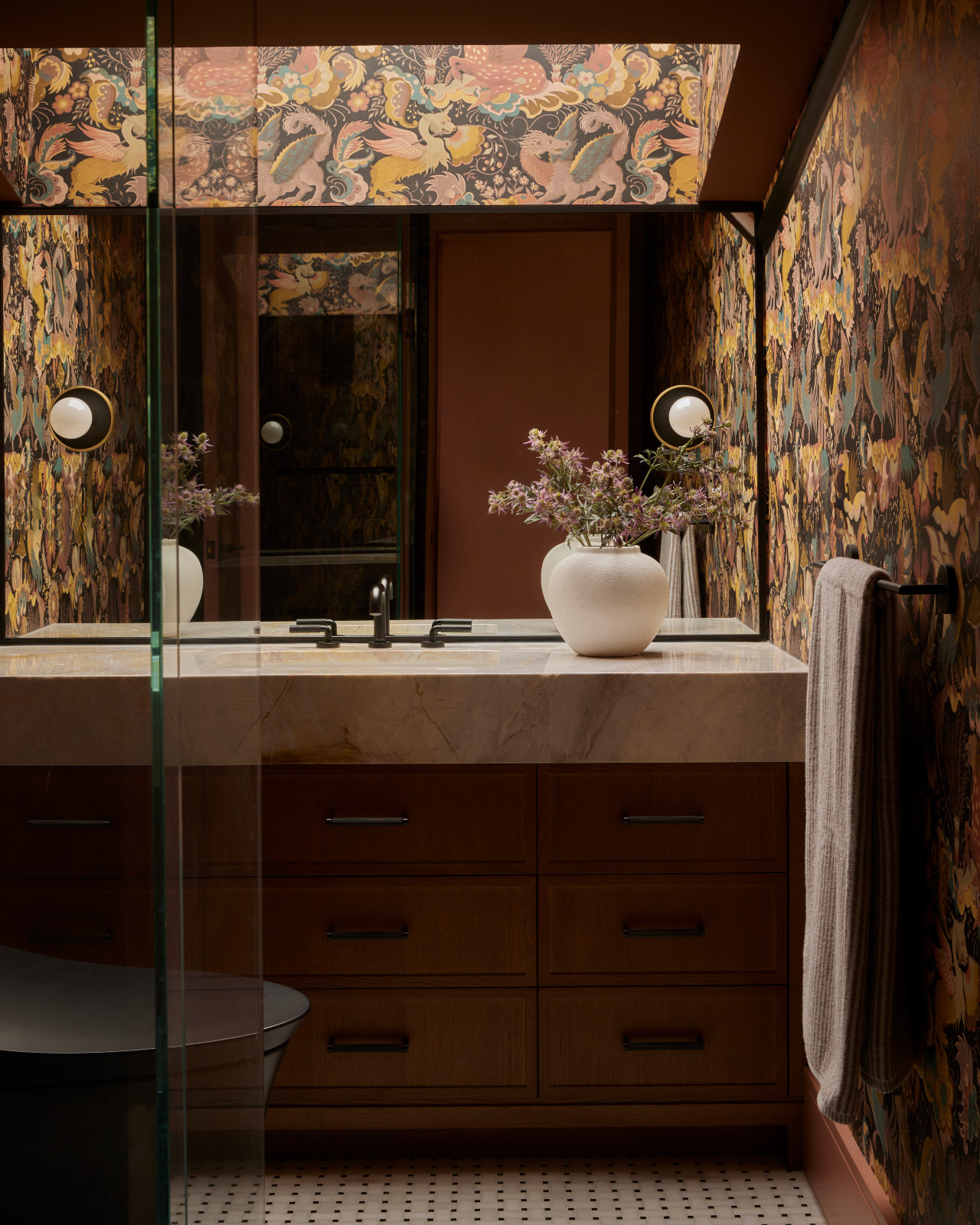 The powder room of a 1980s penthouse, renovated by Dvira Interiors in Toronto, Canada