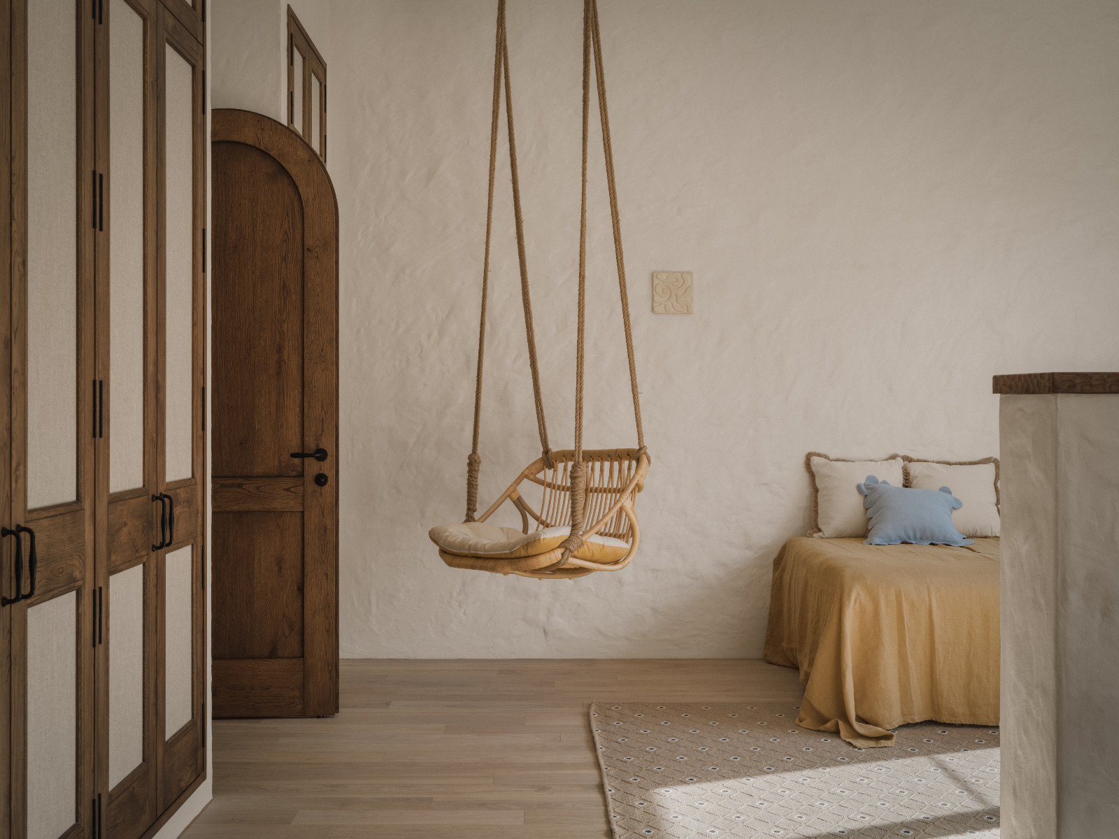 The bedroom of an Almaty, Kazakhstan family apartment designed by Kamilya Zhakypova of Alchemia.group