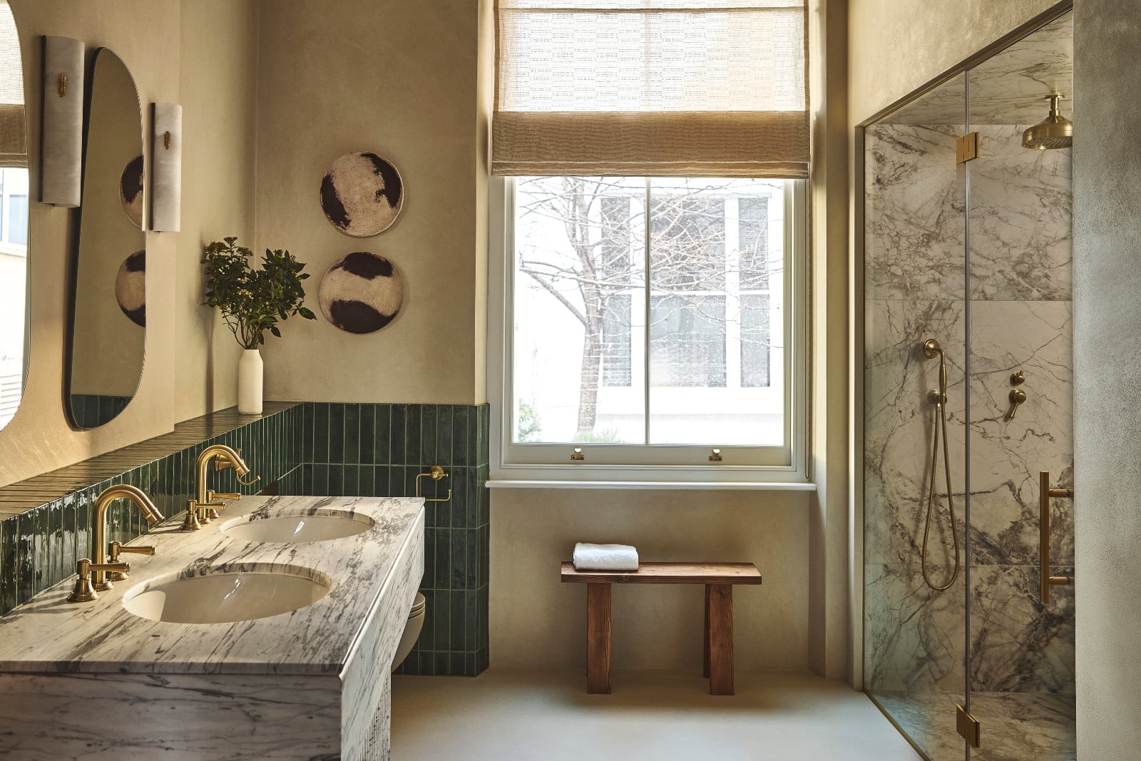 The ensuite bathroom of a Notting Hill home by Project London