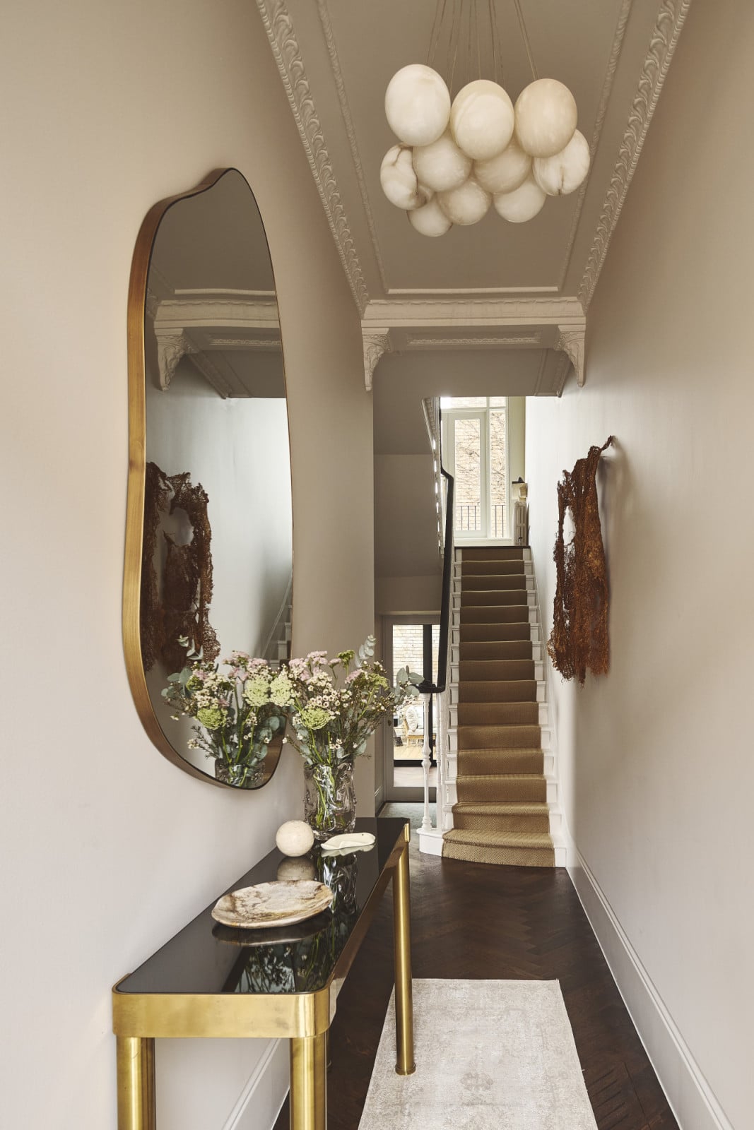 The entryway of a Notting Hill home by Project London