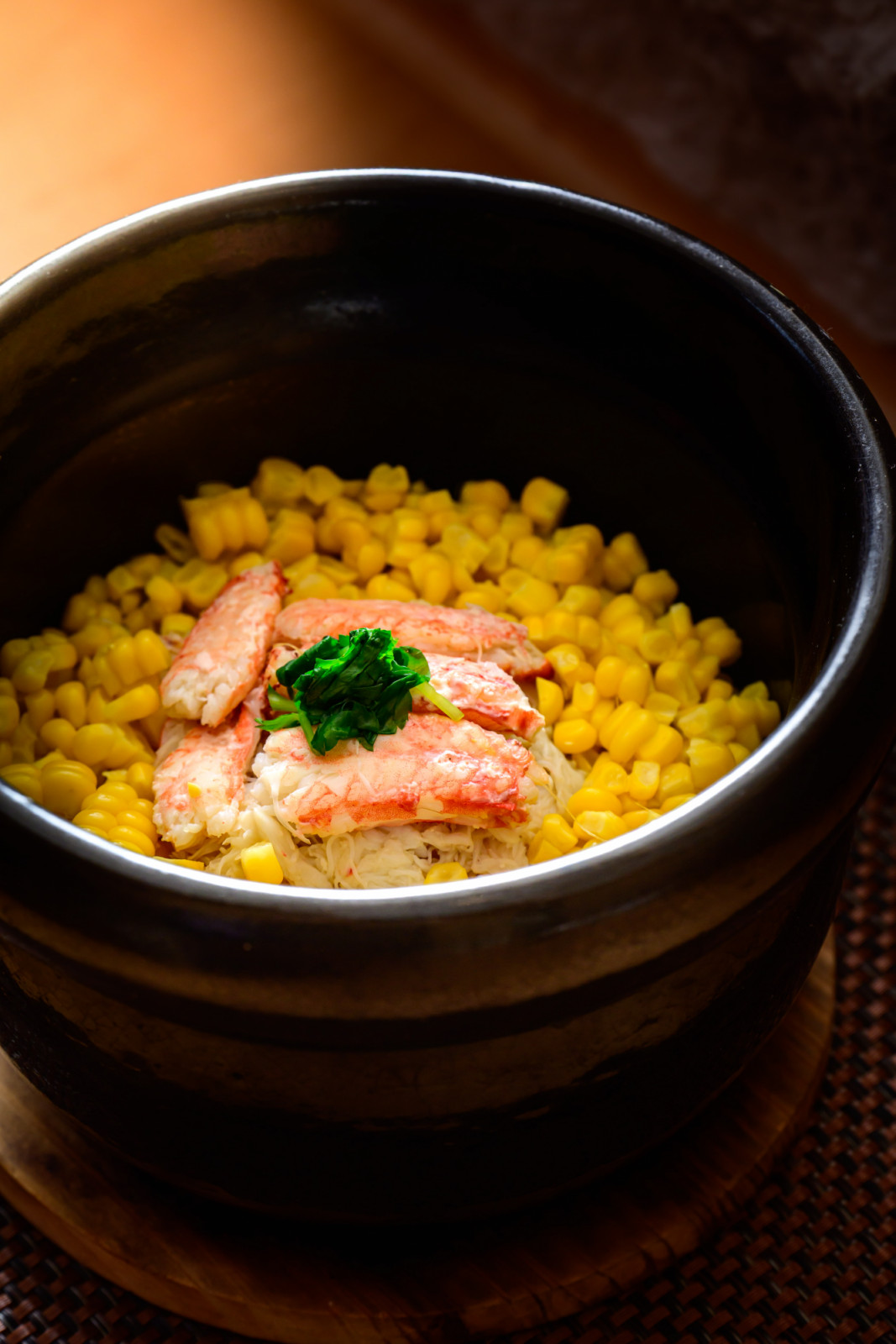 A vibrant dish of crab meat and sweet corn by Hana no Kumo.