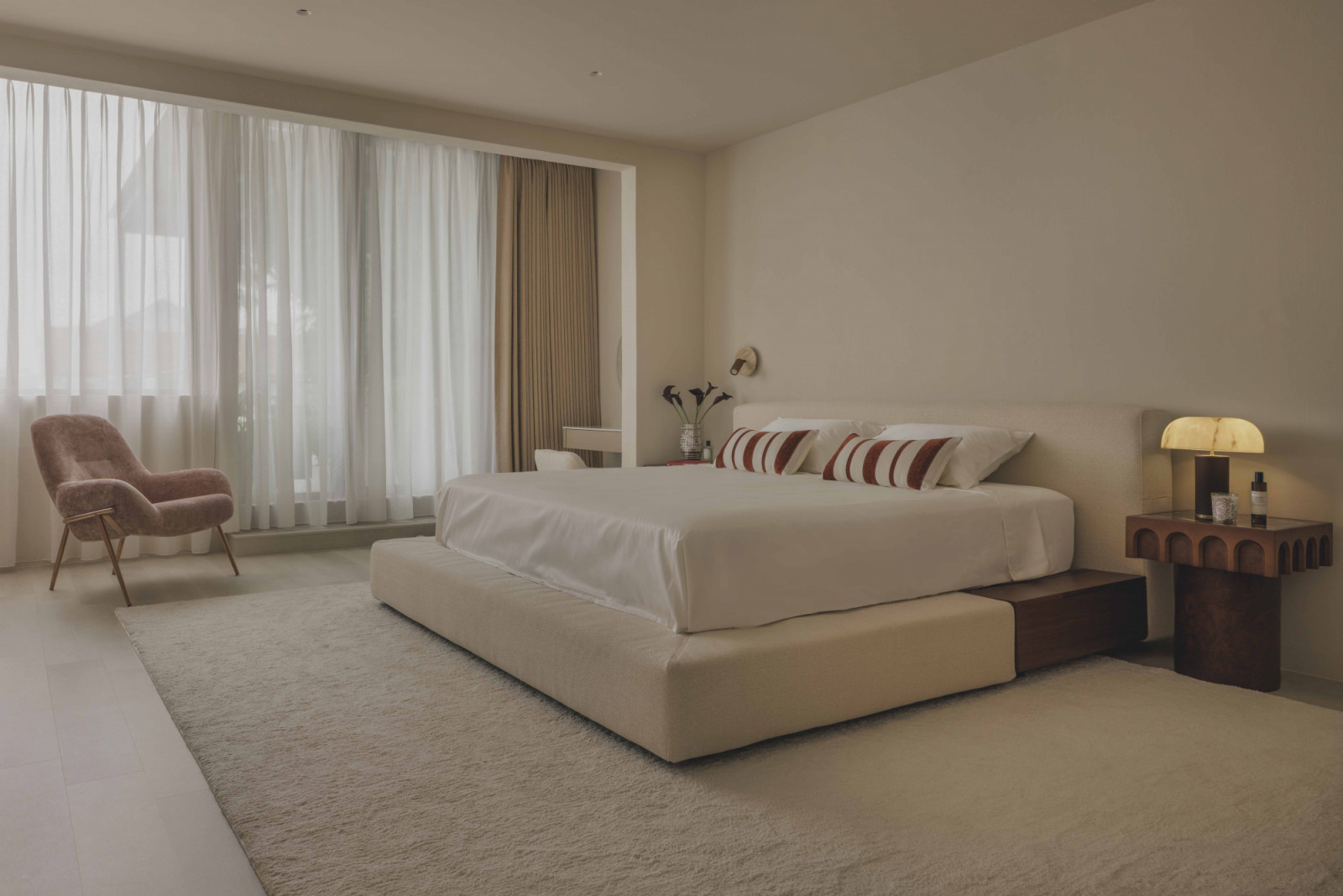 The master bedroom is an almost monastic oasis of calm