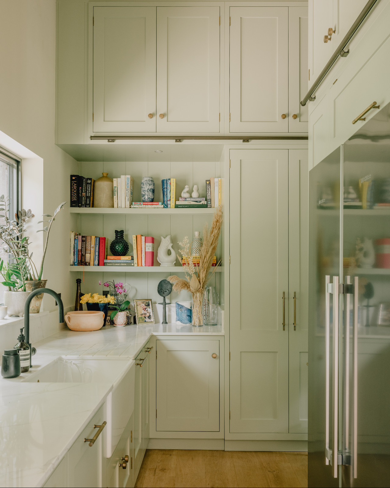 The back kitchen of a renovated barn home in Wiltshire, England by Munro