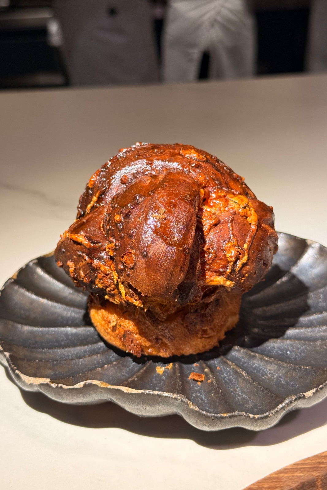 Laminated brioche with aged Gouda, and sharp cheddar from Helm by Josh Boutwood's Single Ingredient menu