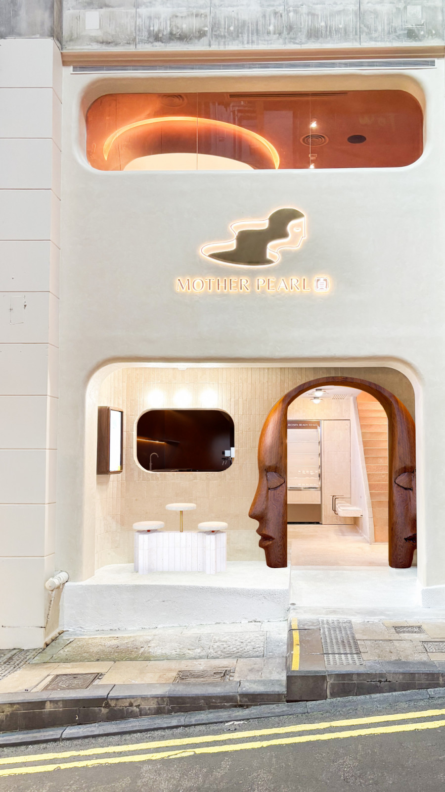 Mother Pearl's newest outpost makes a bold statement with its distinctive wooden face entrance.