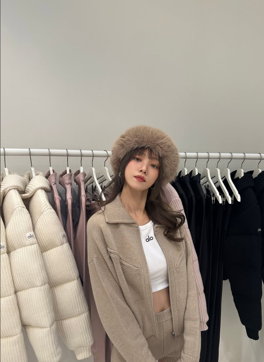 Lee Sung-kyung showcases winter chic in a full Alo Yoga ensemble and a fur hat.
