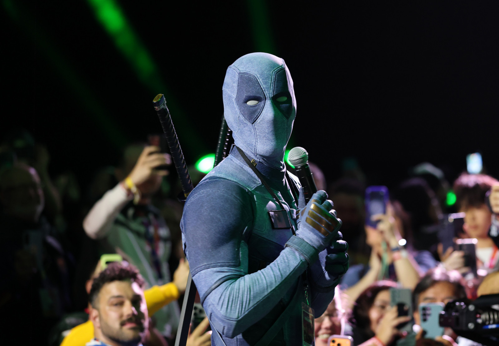 SAN DIEGO, CALIFORNIA - JULY 25: Ryan Reynolds in Deadpool cosplay speaks during the 2026 Comic-Con International: San Diego - Marvel Studios Hall H presentation at San Diego Convention Center on July 25, 2026 in San Diego, California. (Photo by Amy Sussman/Getty Images)