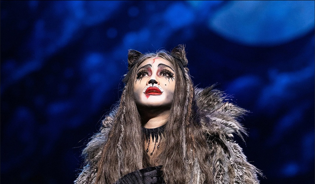 An actor portrays Grizabella, the Glamour Cat, in Andrew Lloyd Webber's enduring musical, Cats.